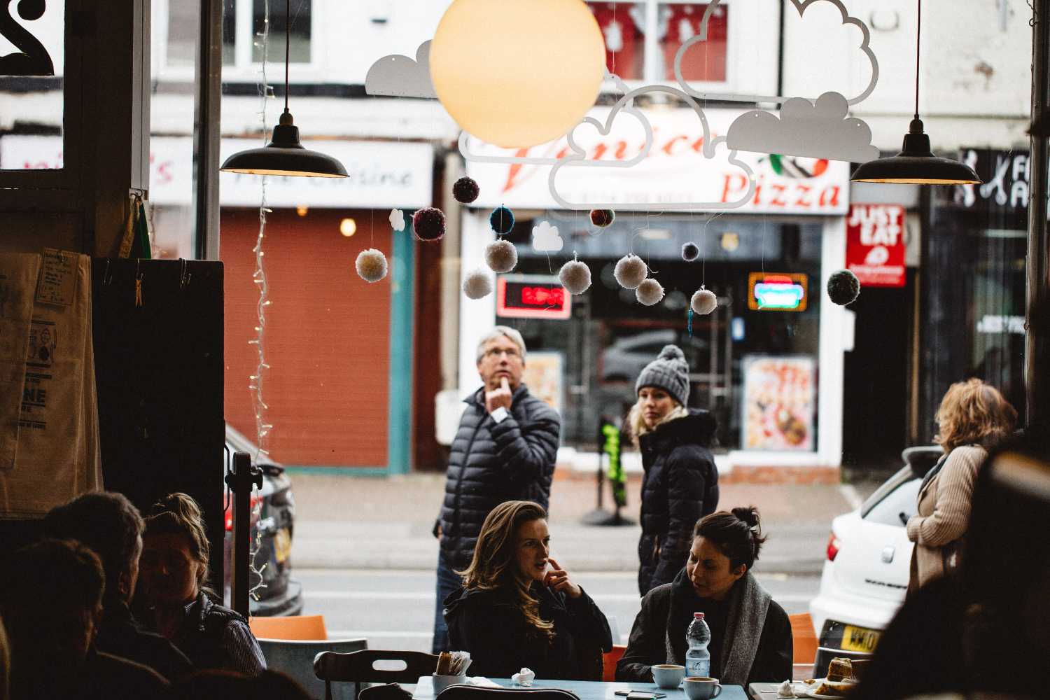 customers looking in through the window