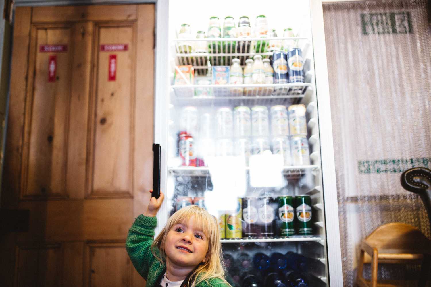 child choosing soft drink