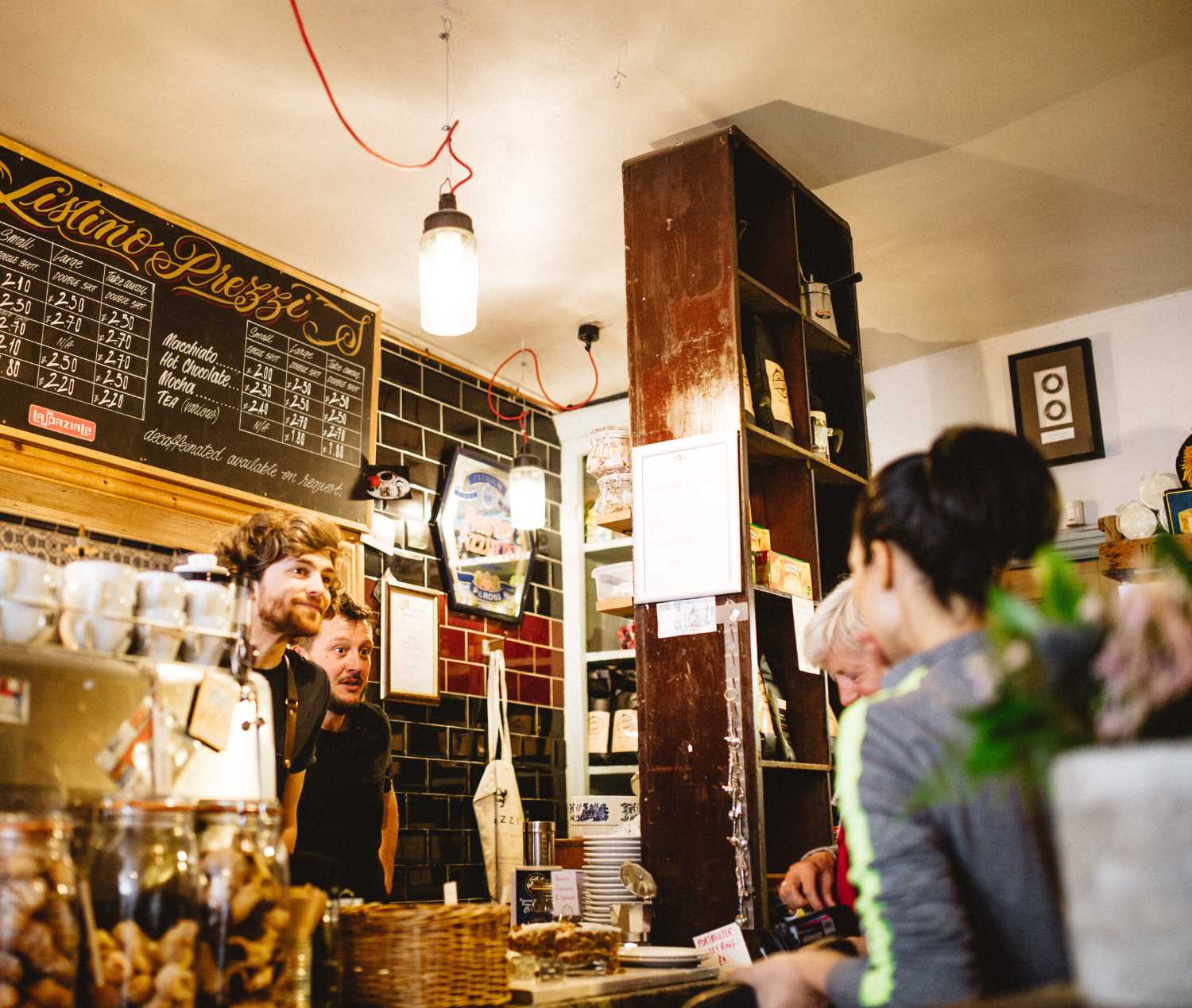 barista serving customer